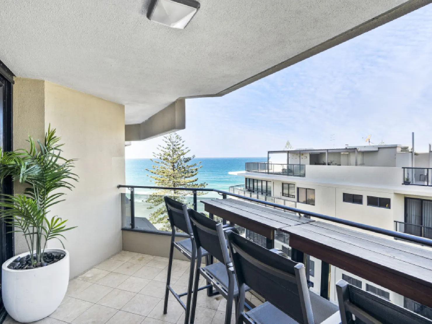 Balcony with breakfast bar and ocean views