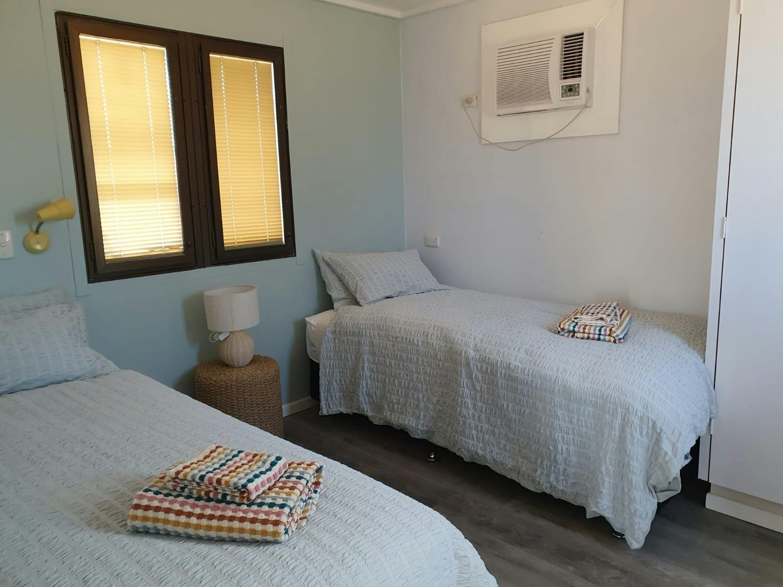 Inside the Merino Cabin twin single room, Charlotte Plains, Outback Queensland