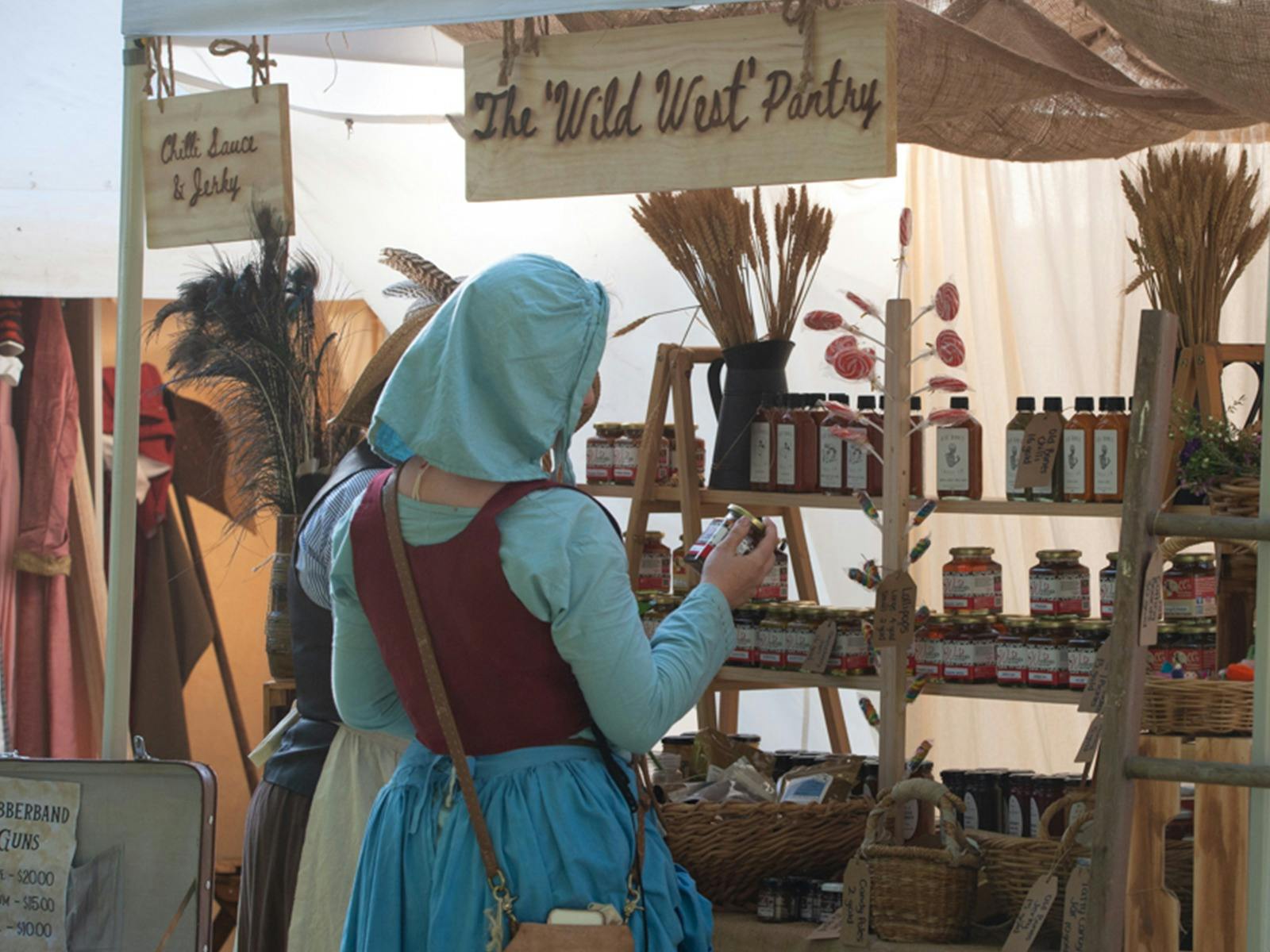 Woman Browsing Market Stall