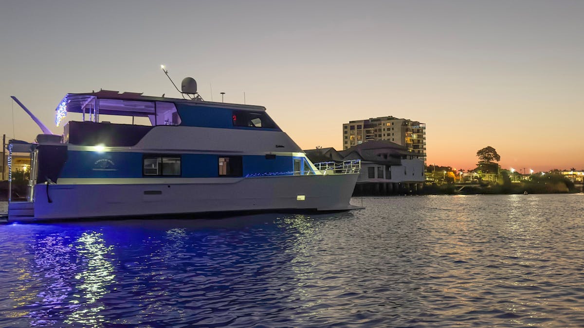 image of vessel in Pioneer River at sunset