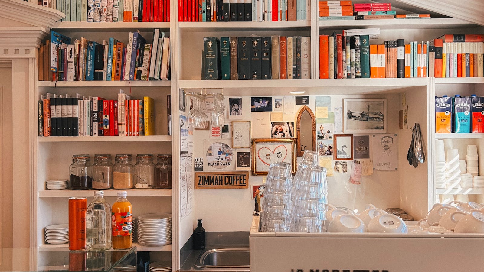 Coffee and books meet beneath warm light in the Derwent Valley.