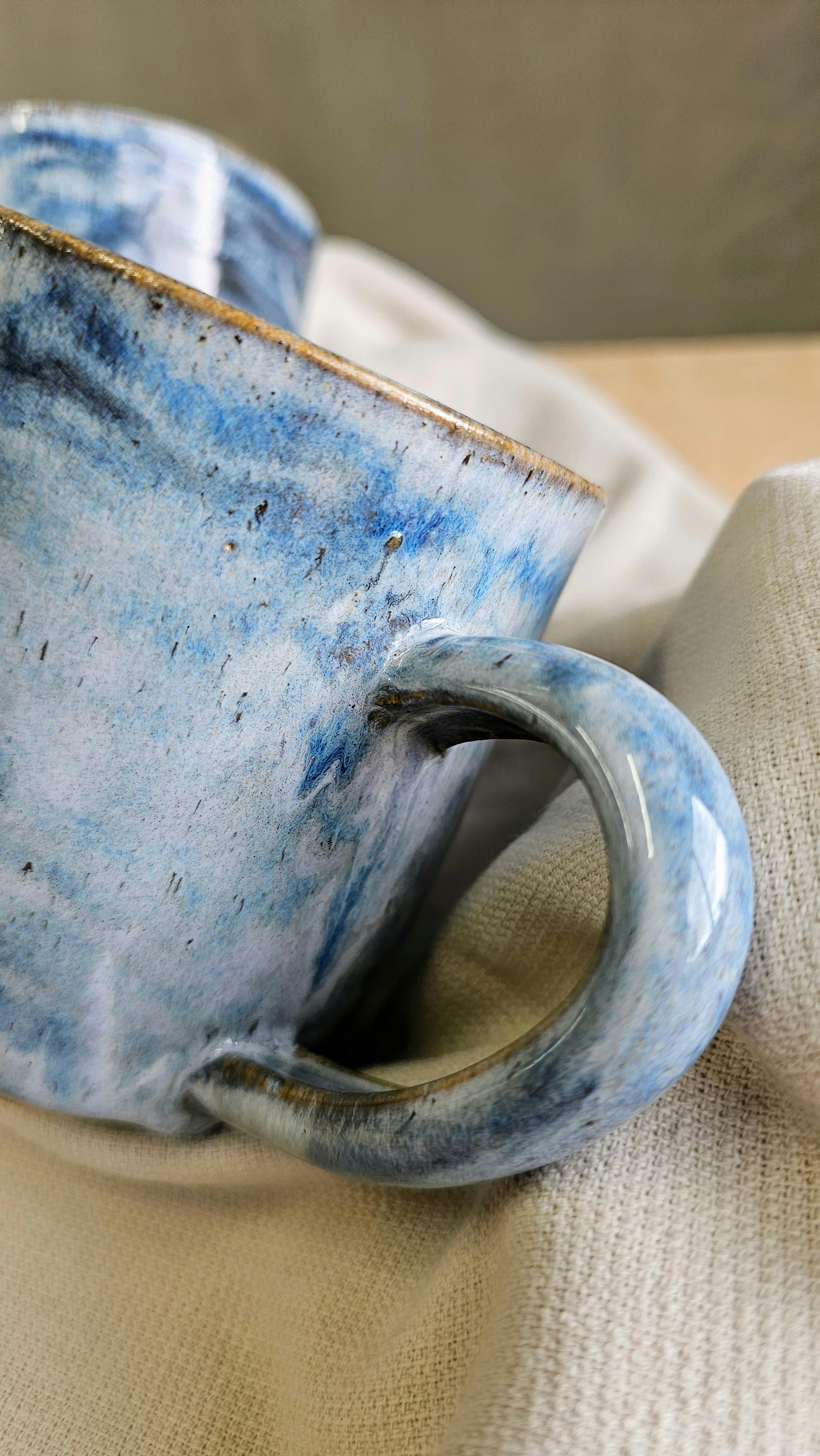 Big handled mug with blue drippy glaze