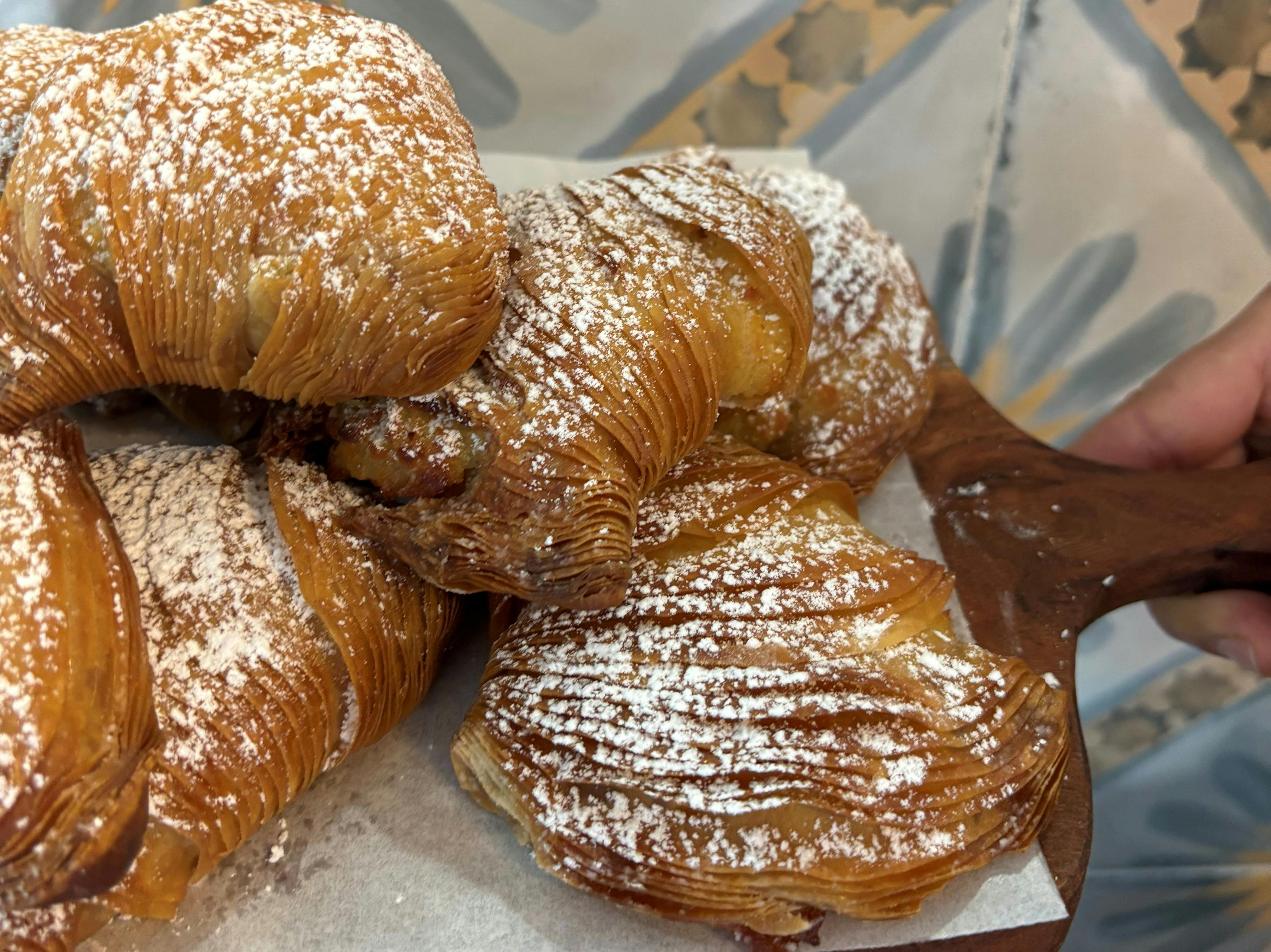 Pastries dusted with icing sugar