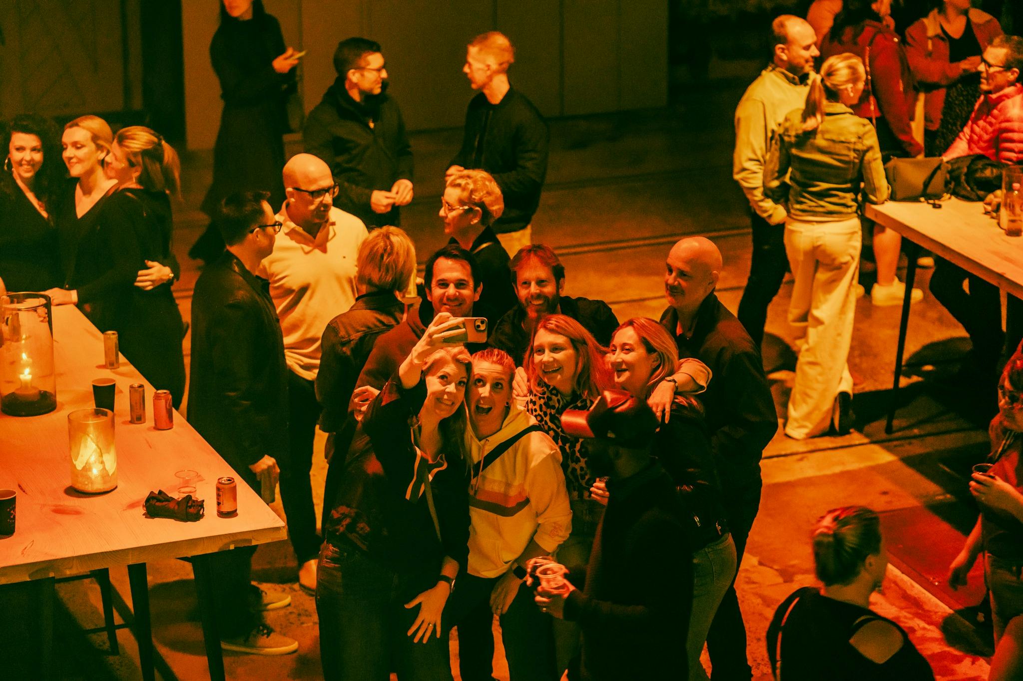 Group of friends taking a selfie at Synthony, Vivid, Carriageworks, 2024
