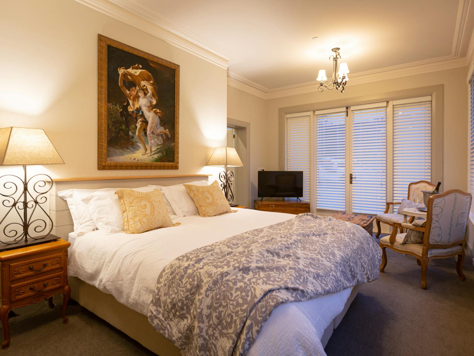 Adorned with bespoke furnishings, plush linen.