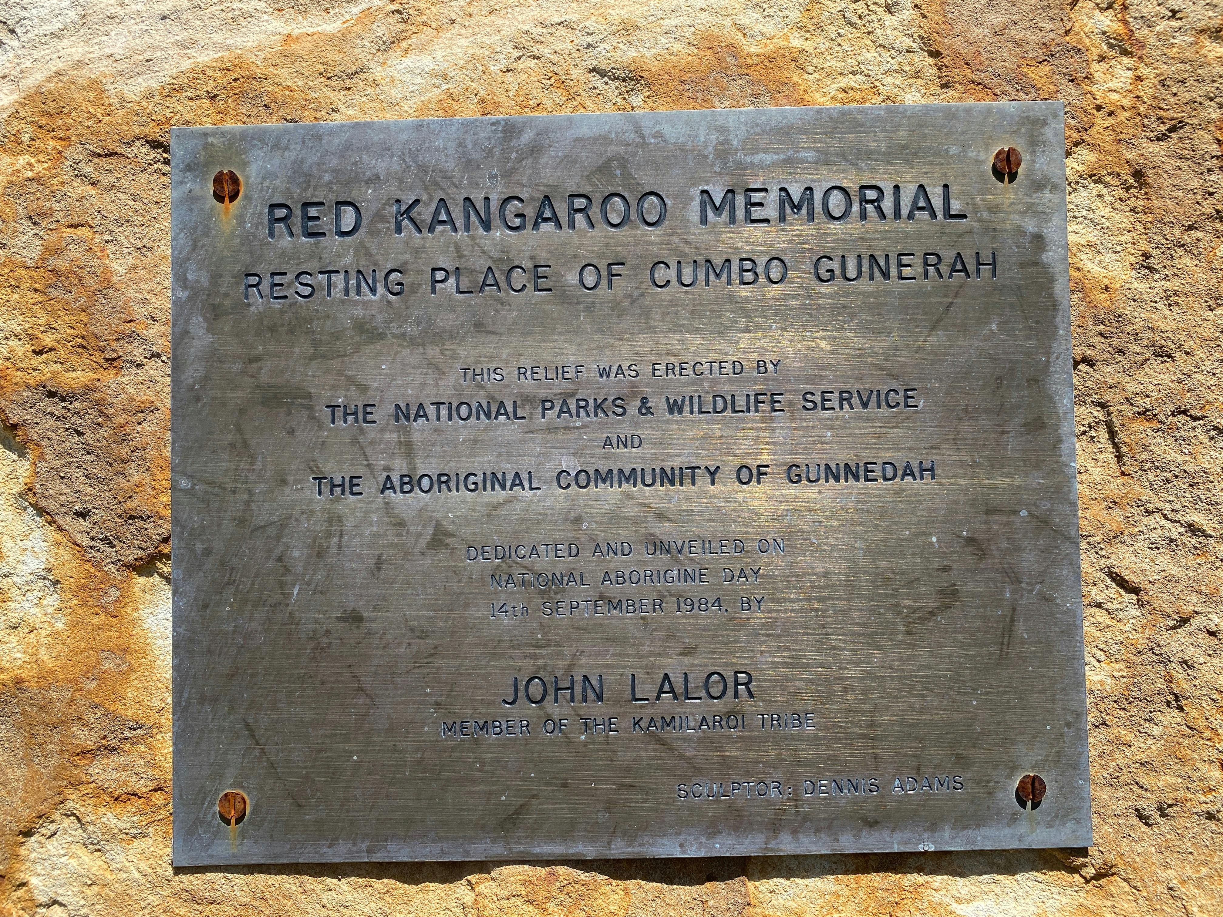 Bronze Plaque with writing on it telling the Red Chief Story