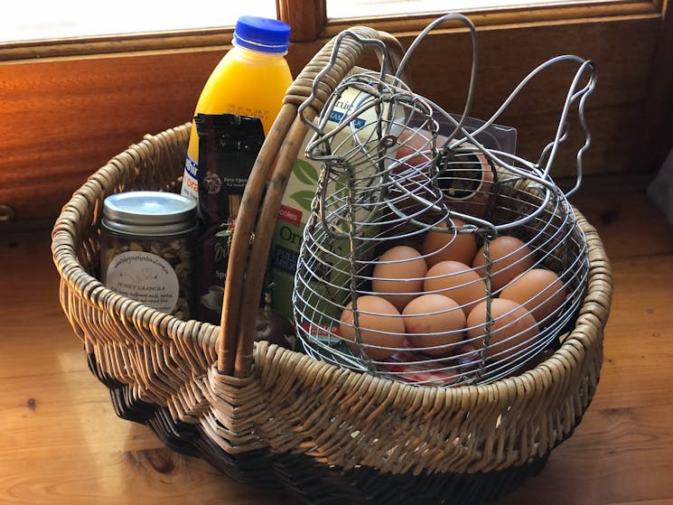 Basket with breakfast food