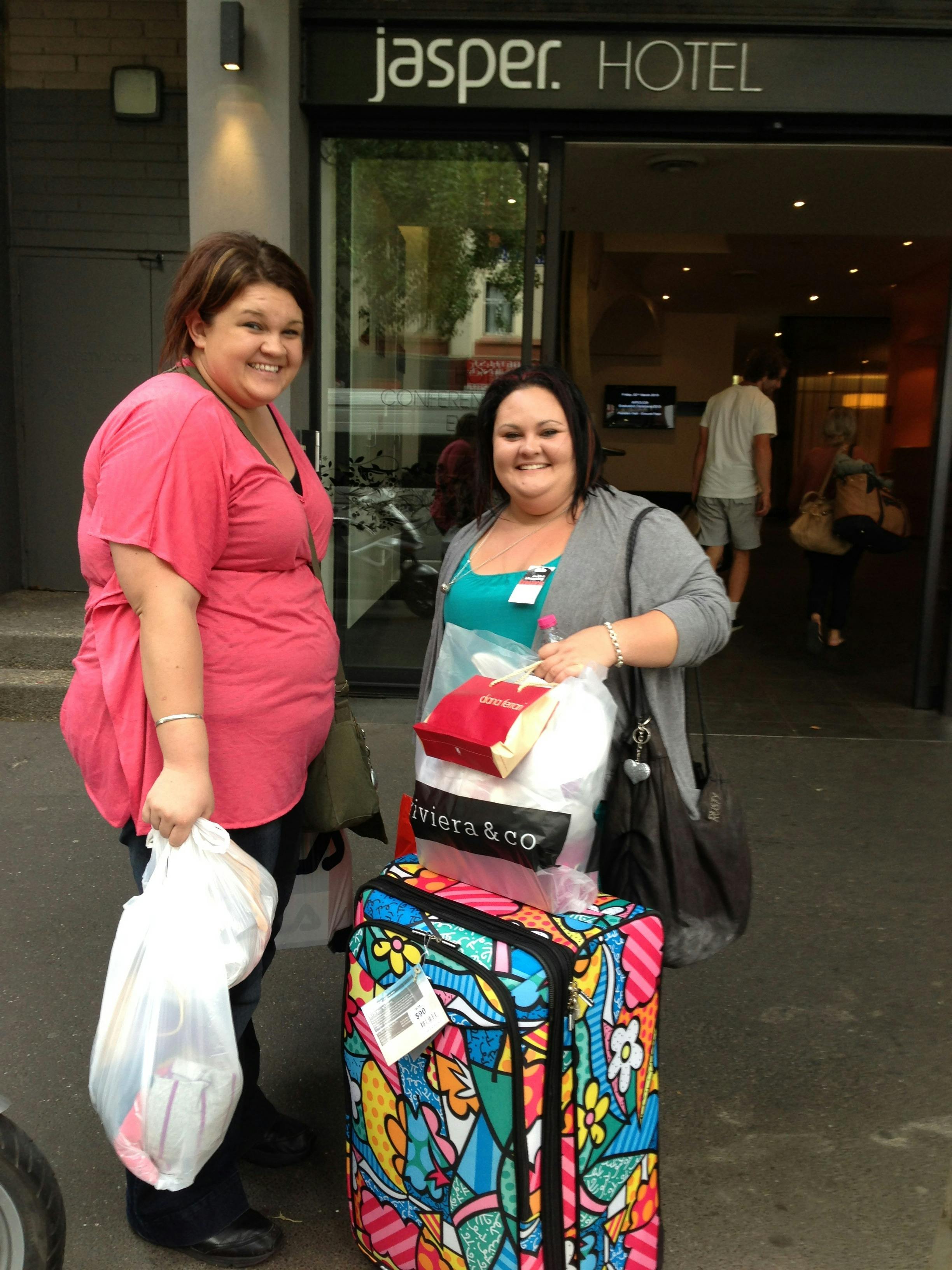 Two women holding shopping bags