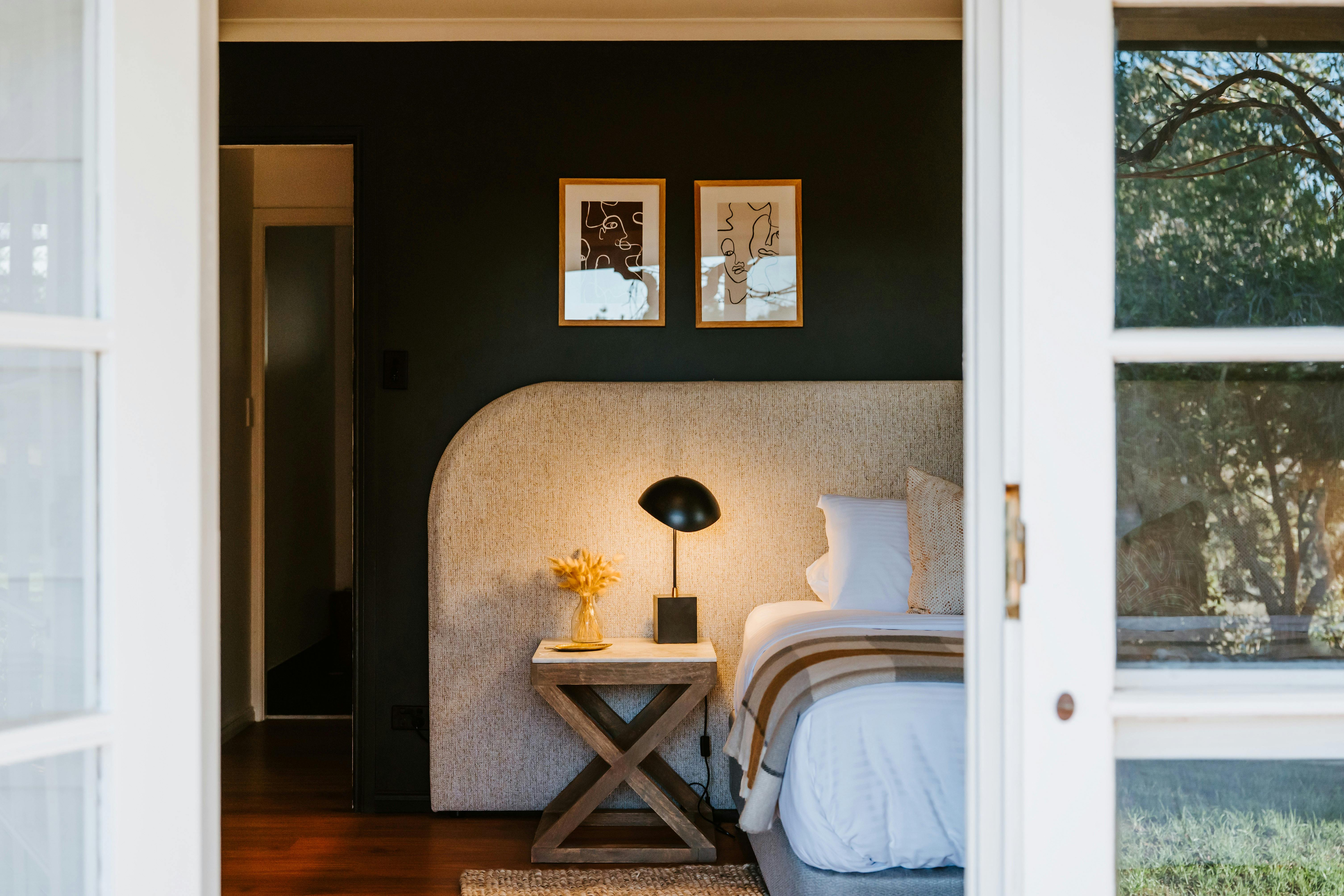 Looking into King Bedroom, garden reflection on french door