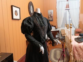 Miegunyah bedroom with Archer dress on display