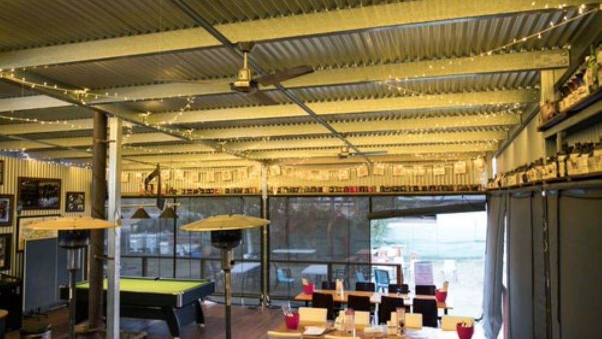 Enjoy a meal in the alfresco dining area.