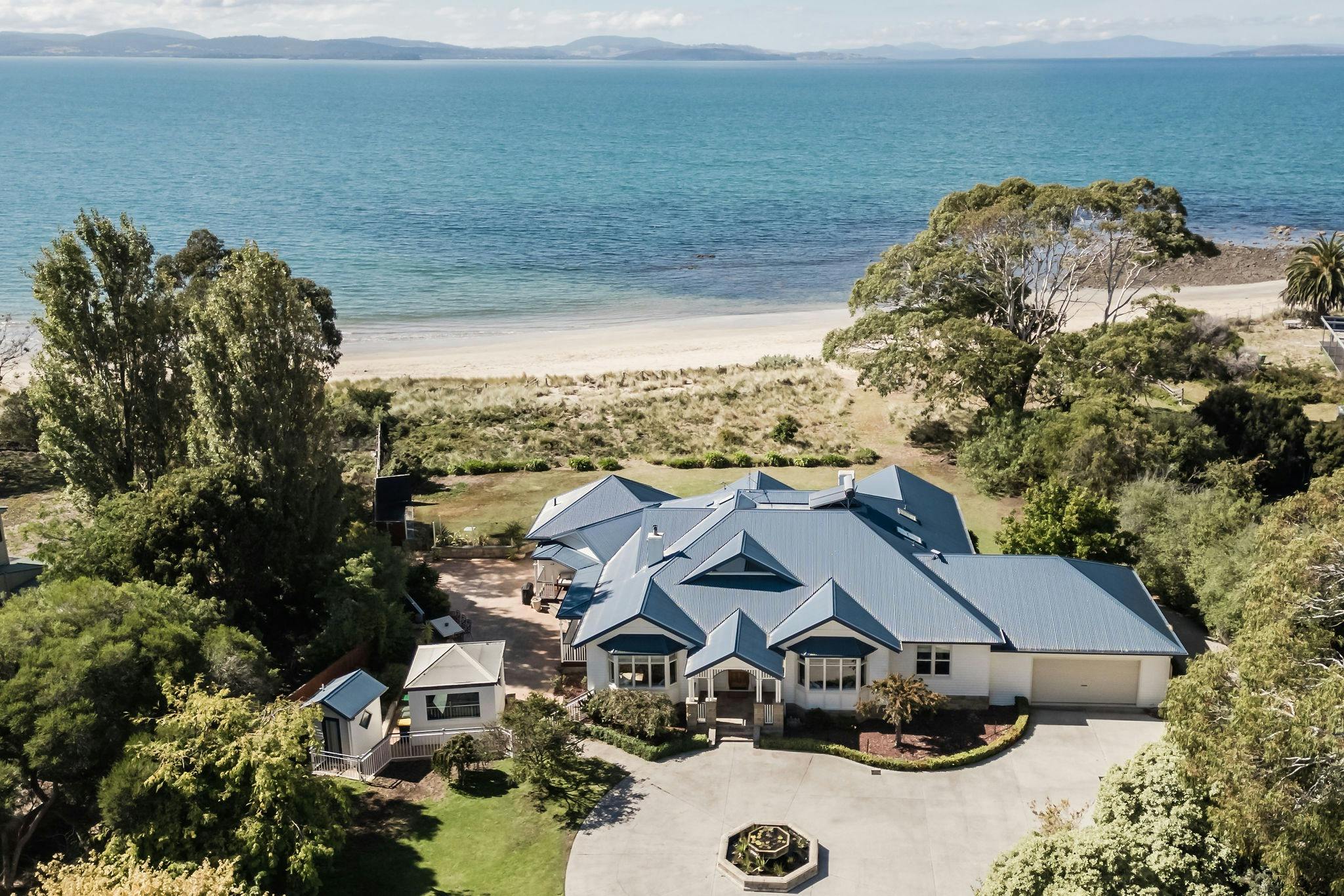 A birdseye shot of the property showing its proximity to the beach