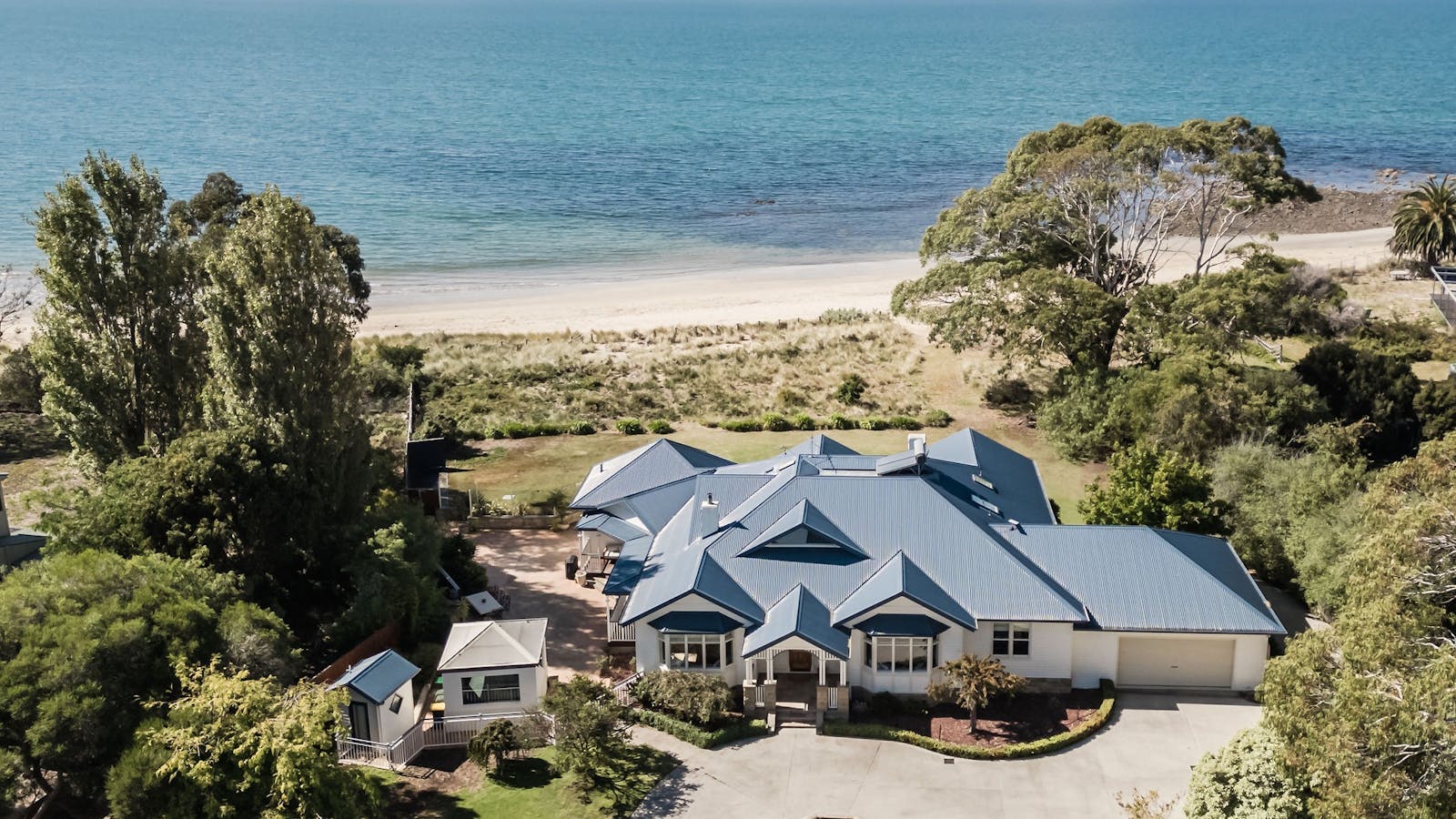 A birdseye shot of the property showing its proximity to the beach