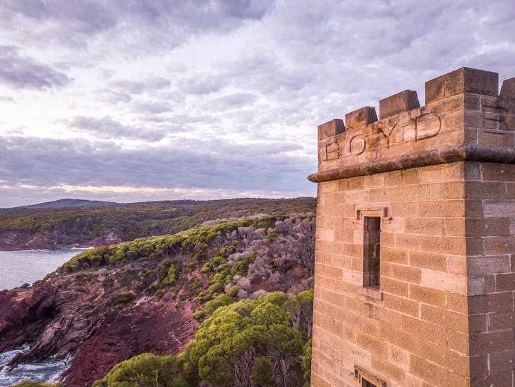 Sun rising over Boyd Tower on Red Point in the Ben Boyd National Park, Edrom