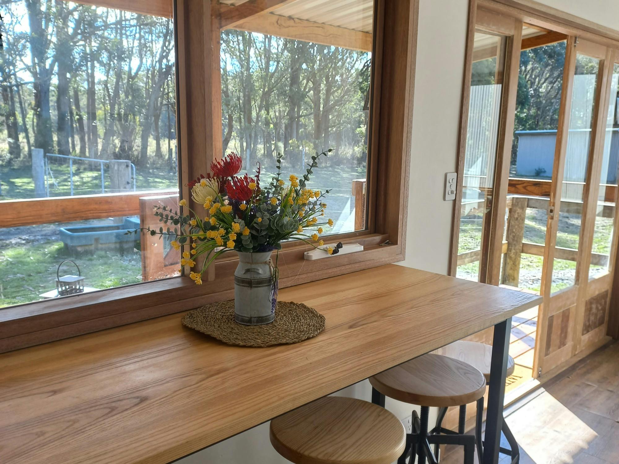 view of nature from breakfast bar in Gang Gang Hideaway