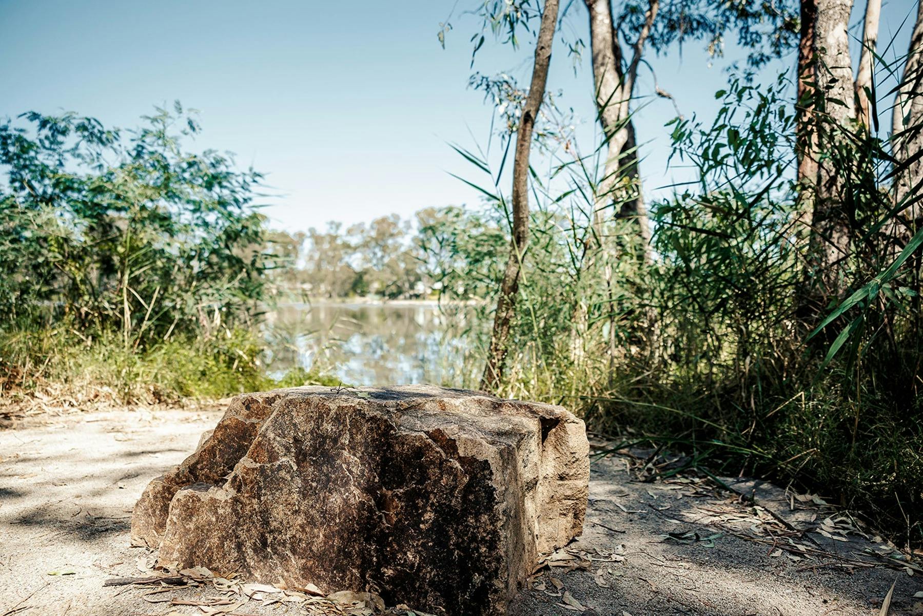 A rock in the Benalla Aboriginal Gardens overlooking Lake Benalla.