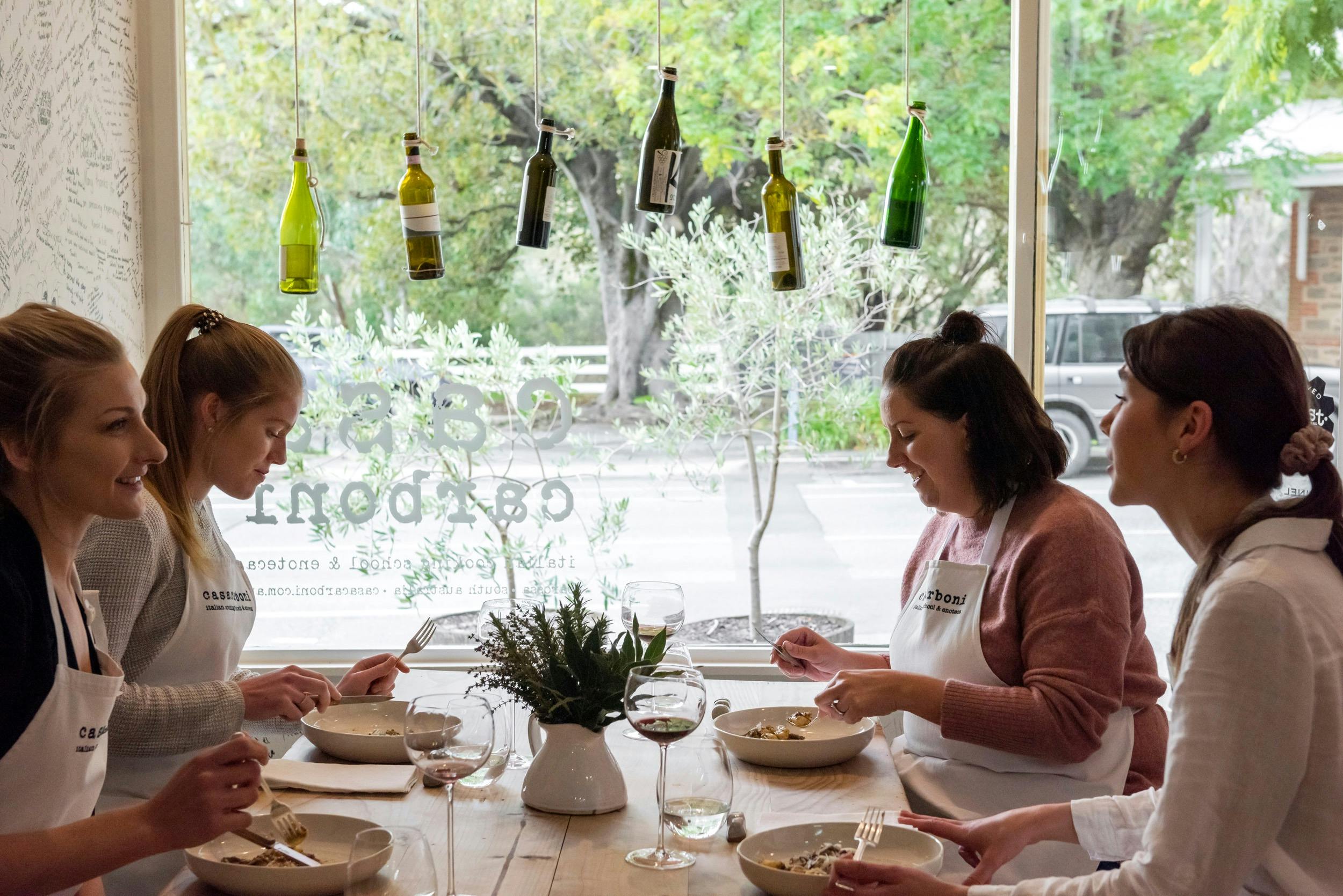 Casa Carboni in Angaston, guests are enjoying the fresh pasta they created in their cooking class
