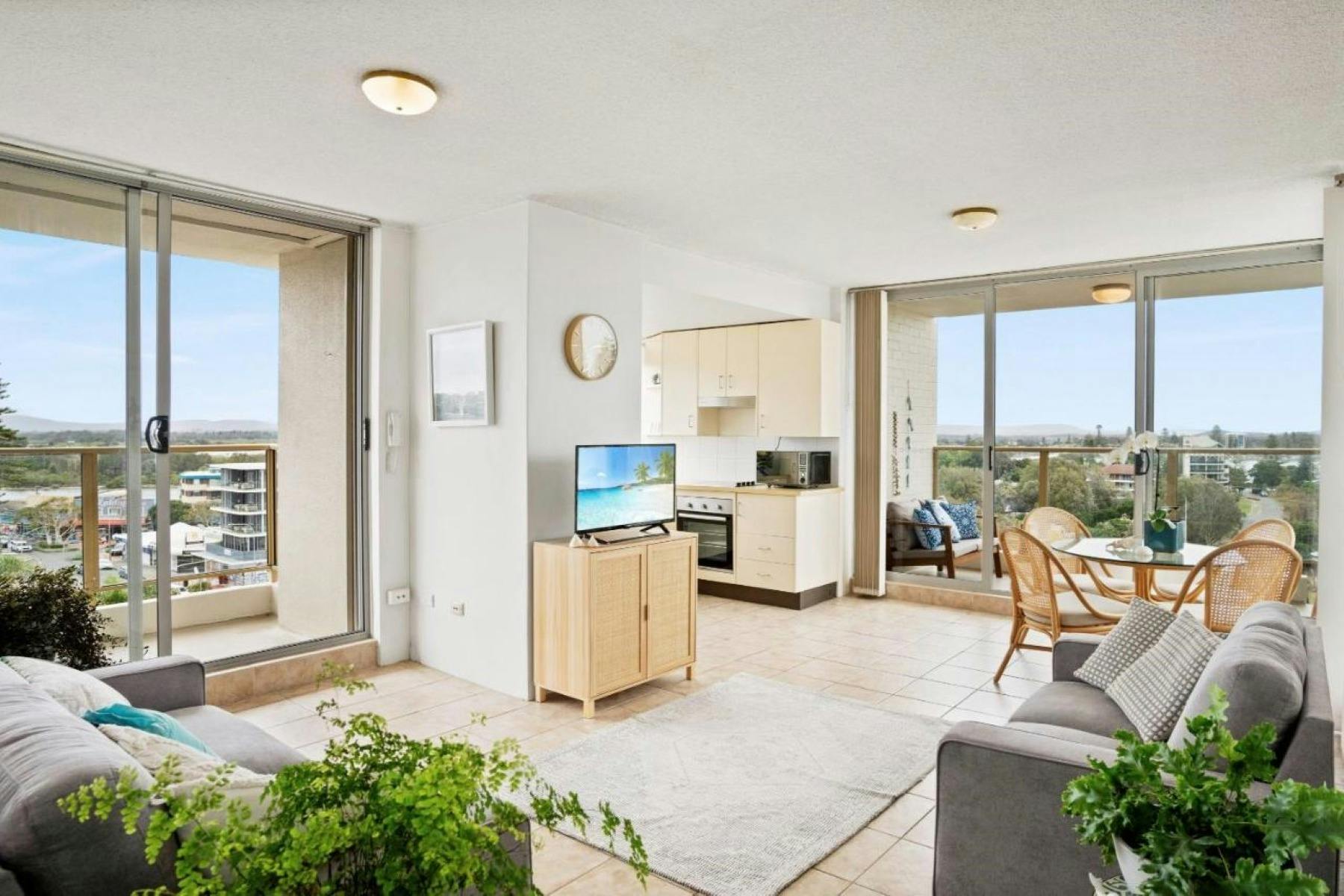Lounge and dining area leading out to balcony