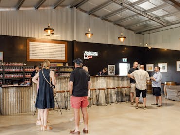 Guests gather inside the Western Queensland Spirit cellar door Guests gather inside the Western Queensland Spirit cellar door