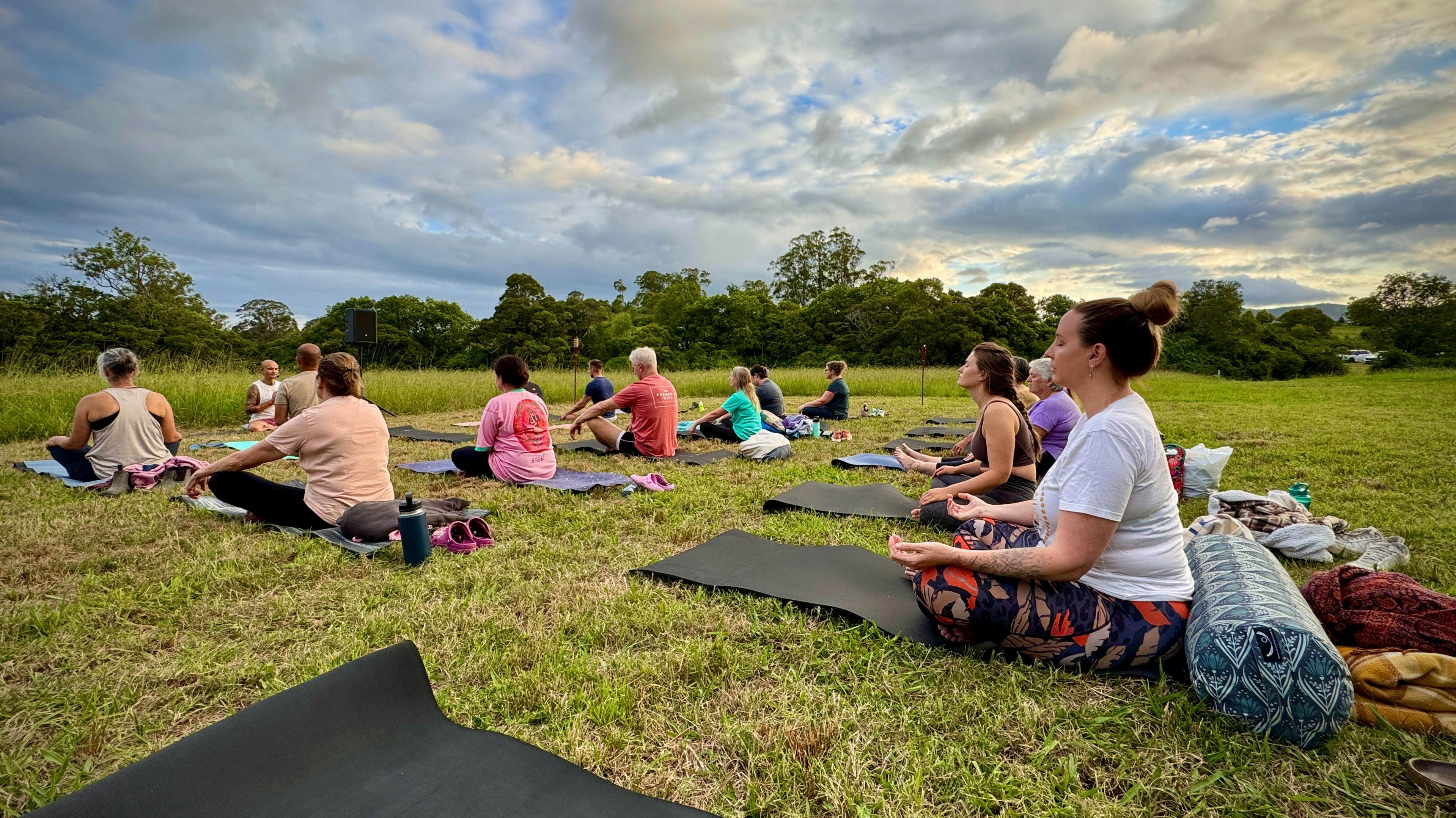 Group doing yoga in our paddock