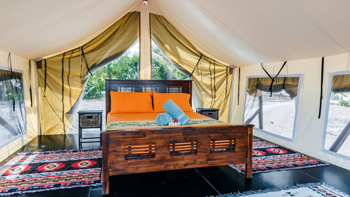 Family and group options available - 1 queen and 3 single beds (family) or 4 single beds (grper tent