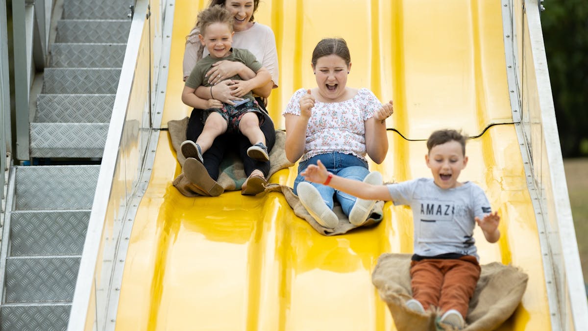 Caboolture-family-fun-day-kids-on-slide