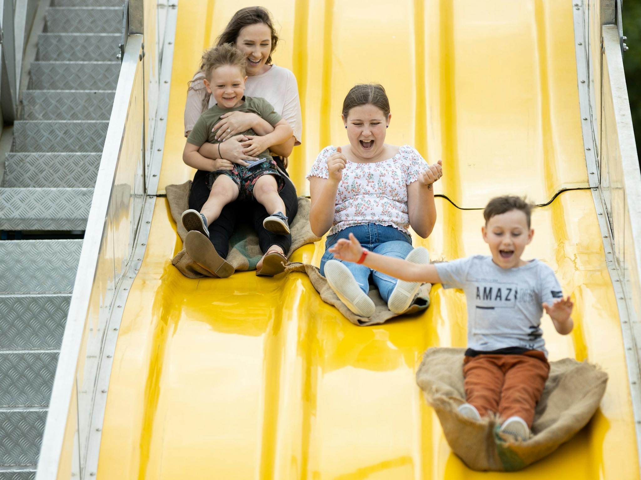 Caboolture-family-fun-day-kids-on-slide Caboolture-family-fun-day-kids-on-slide