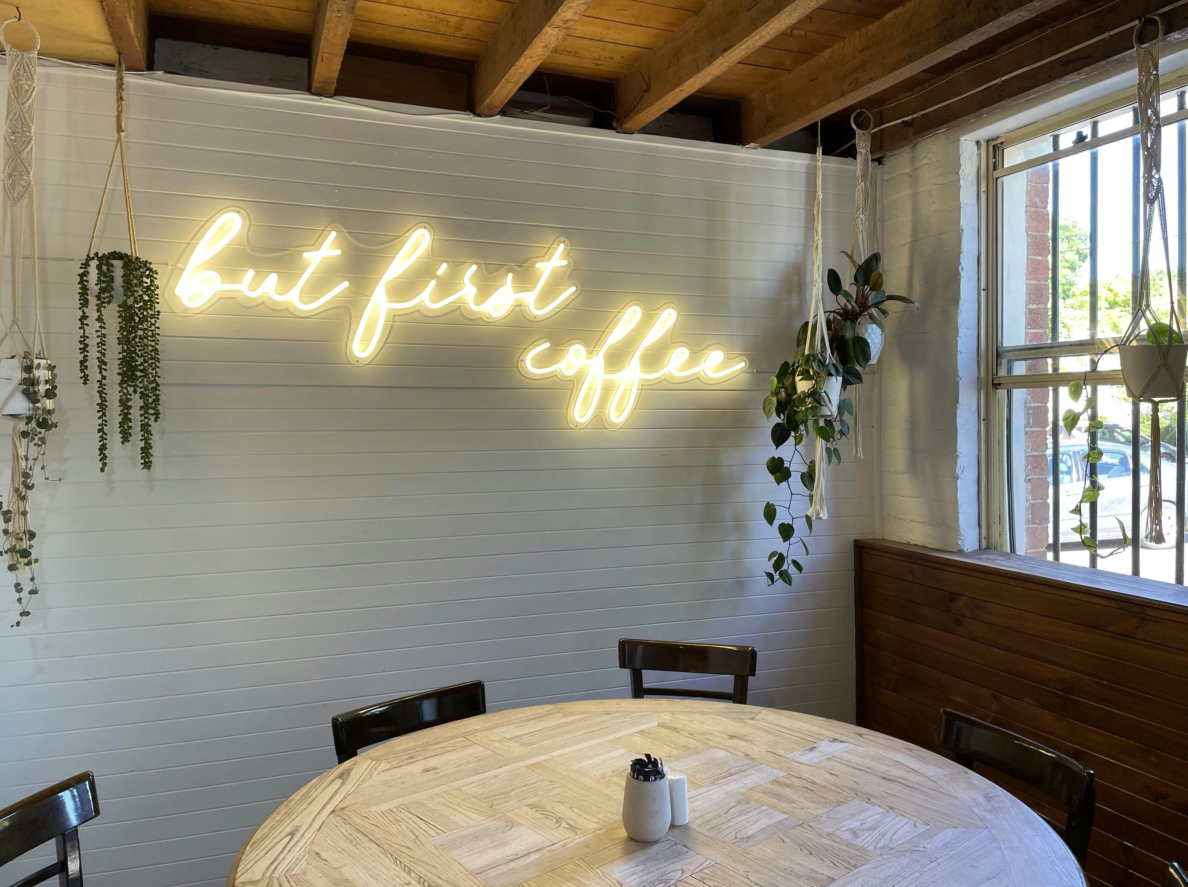 Sign which says ' But first coffee', inside Merino Cafe, Gunning,