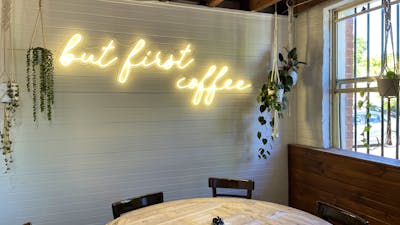 Sign which says ' But first coffee', inside Merino Cafe, Gunning,