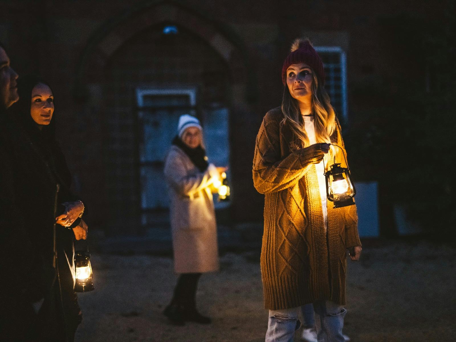 Guests at Willow Court holding lanterns