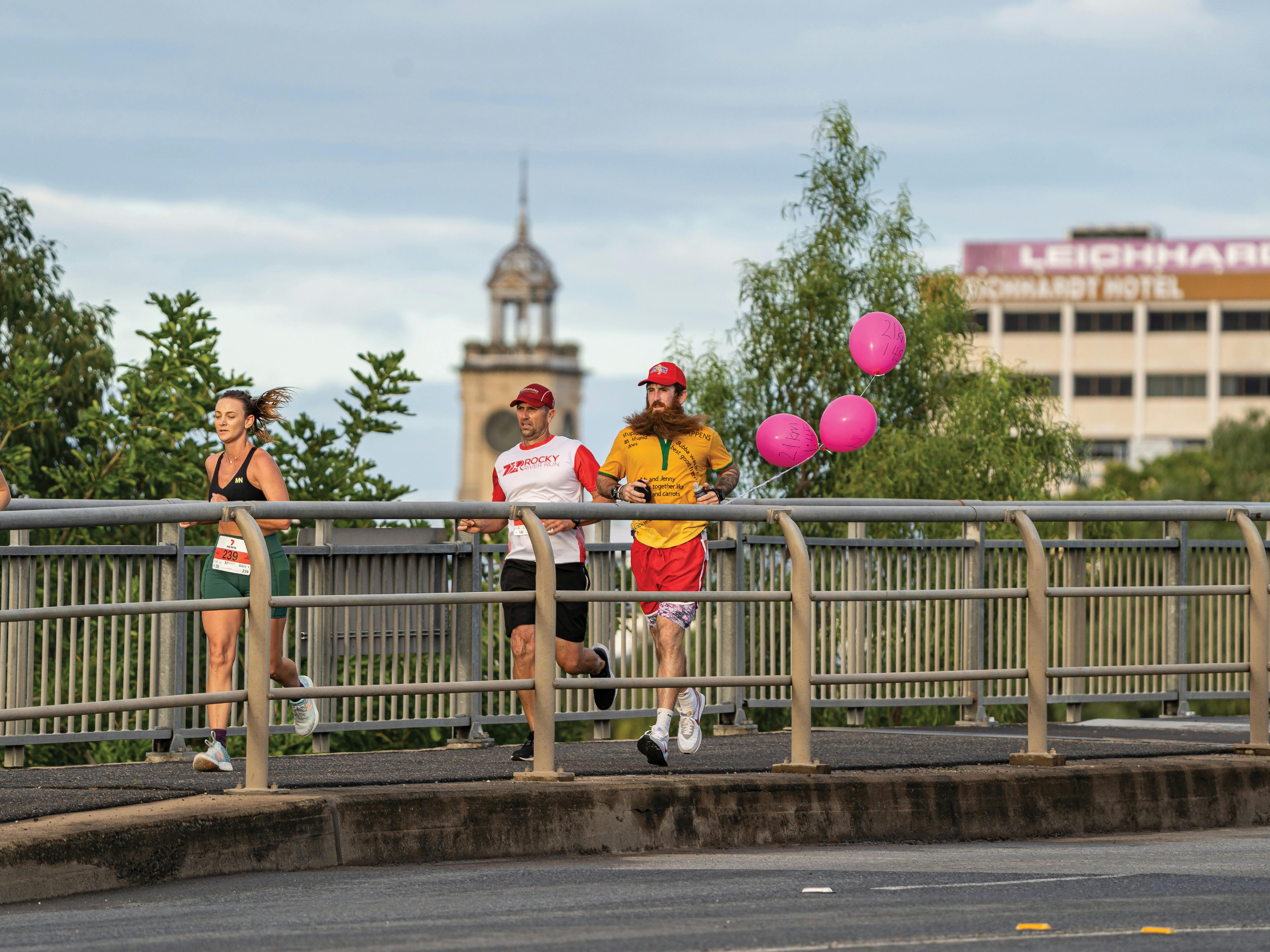 Runners crossing the bridge at the Rocky River Run 2022 event