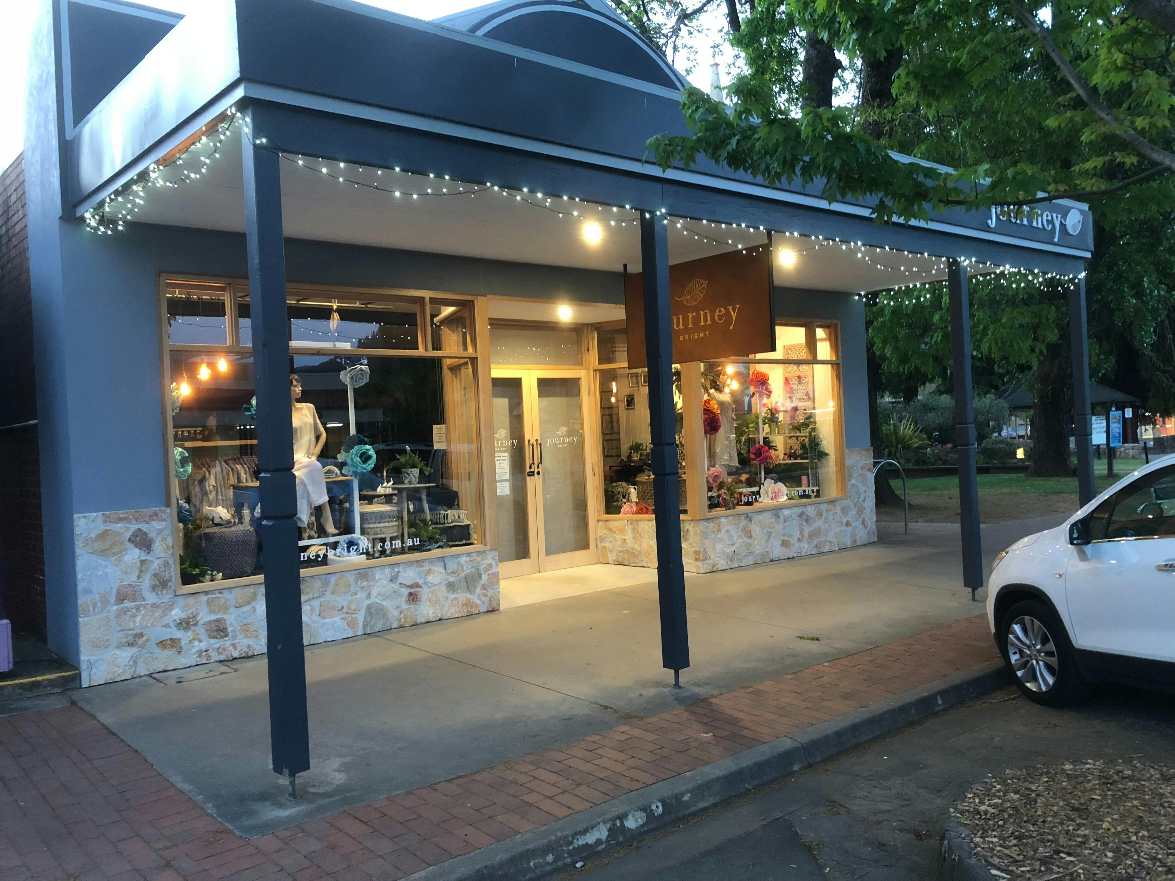 Outside of Journey Bright with fairy lights