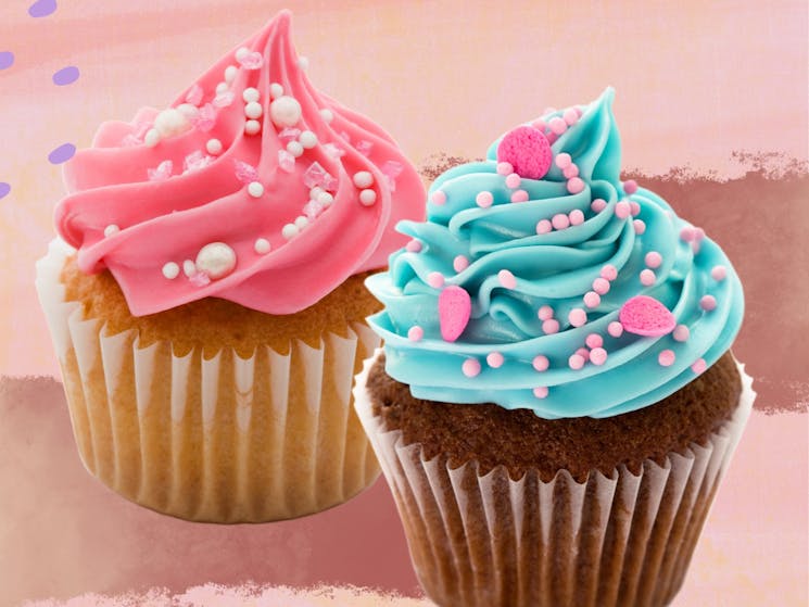 pink and blue decorated cup cakes