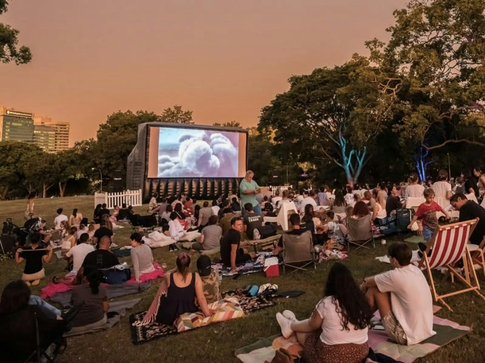 Image of an open air movie screened in a park in Australia