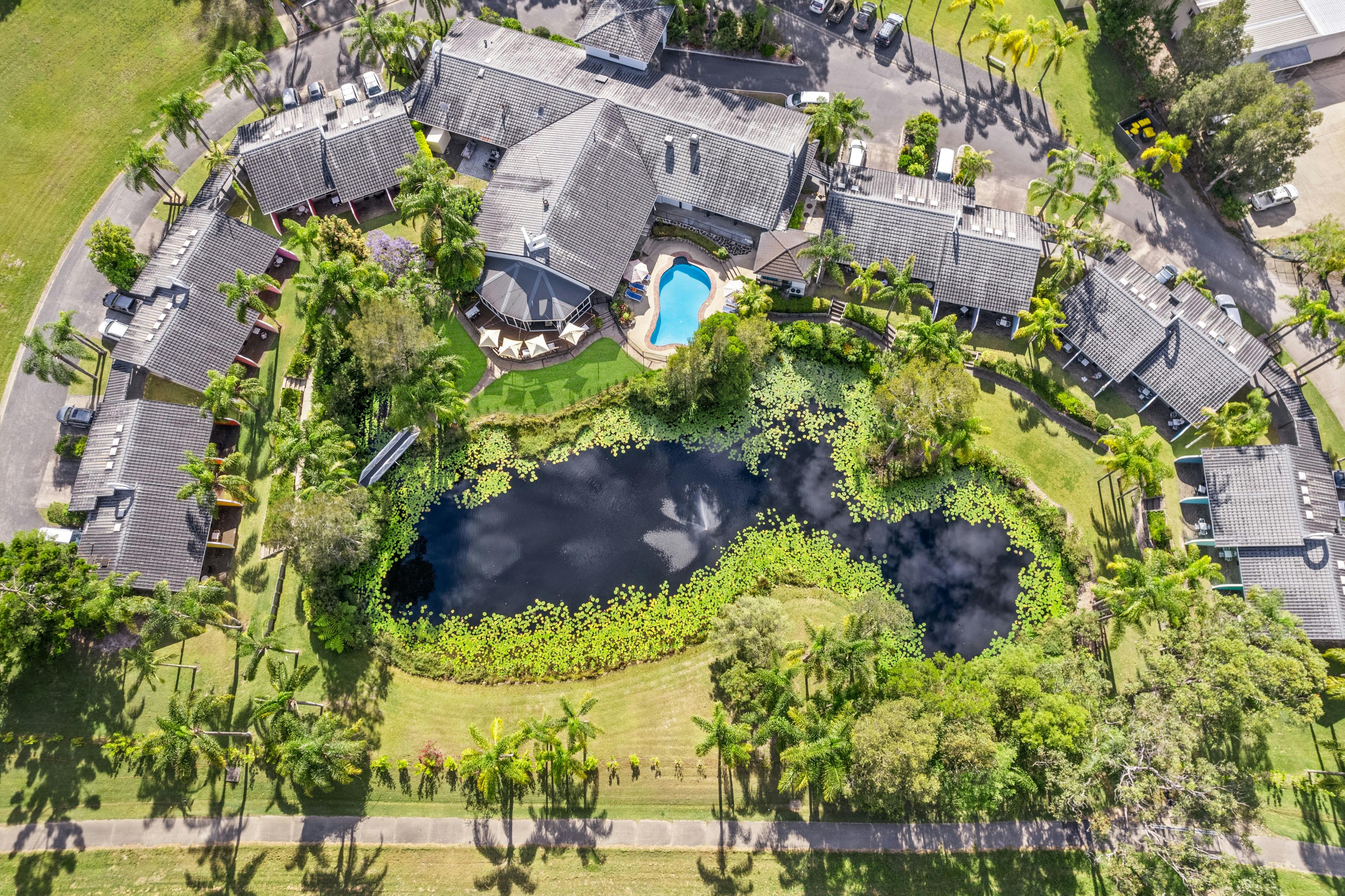 Located in Nambucca Heads, this  colourful retro motel is surrounded by lush landscaping and pond