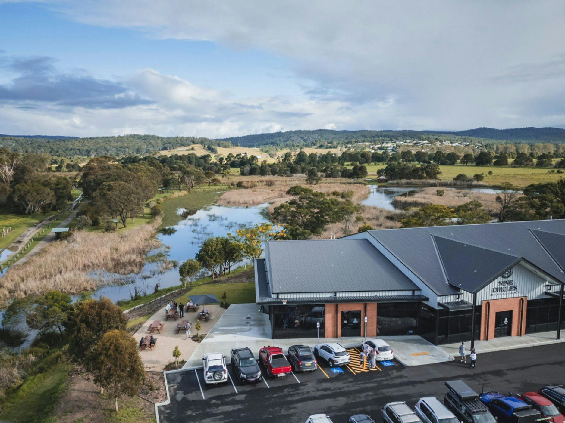 A drone image of the distillery and surrounding wetlands from the sky