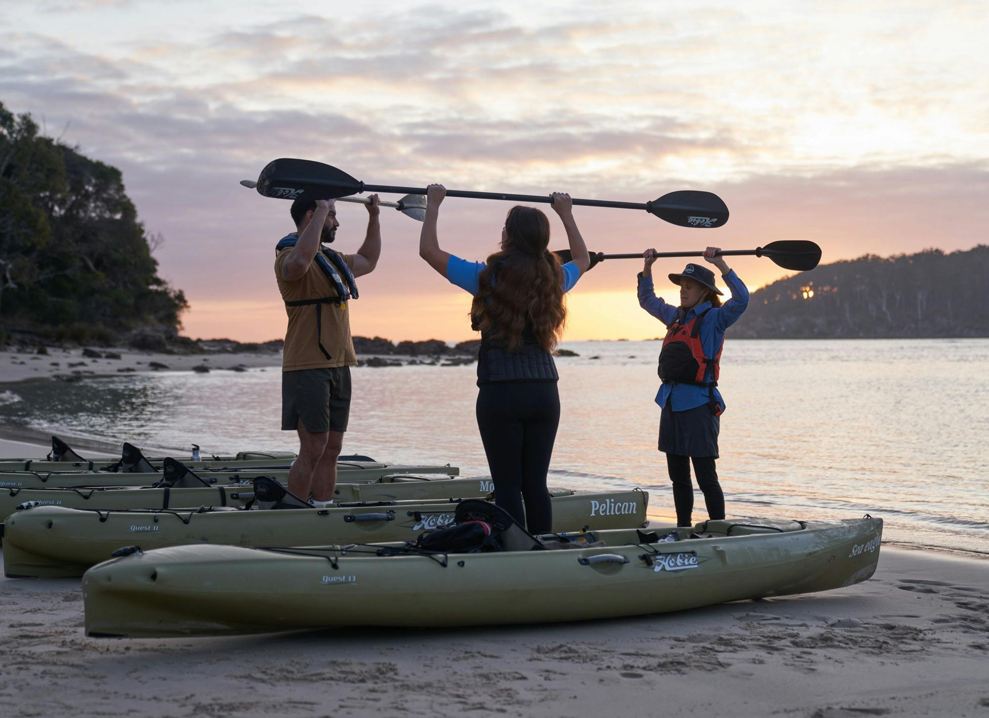 Guests learning how to paddle