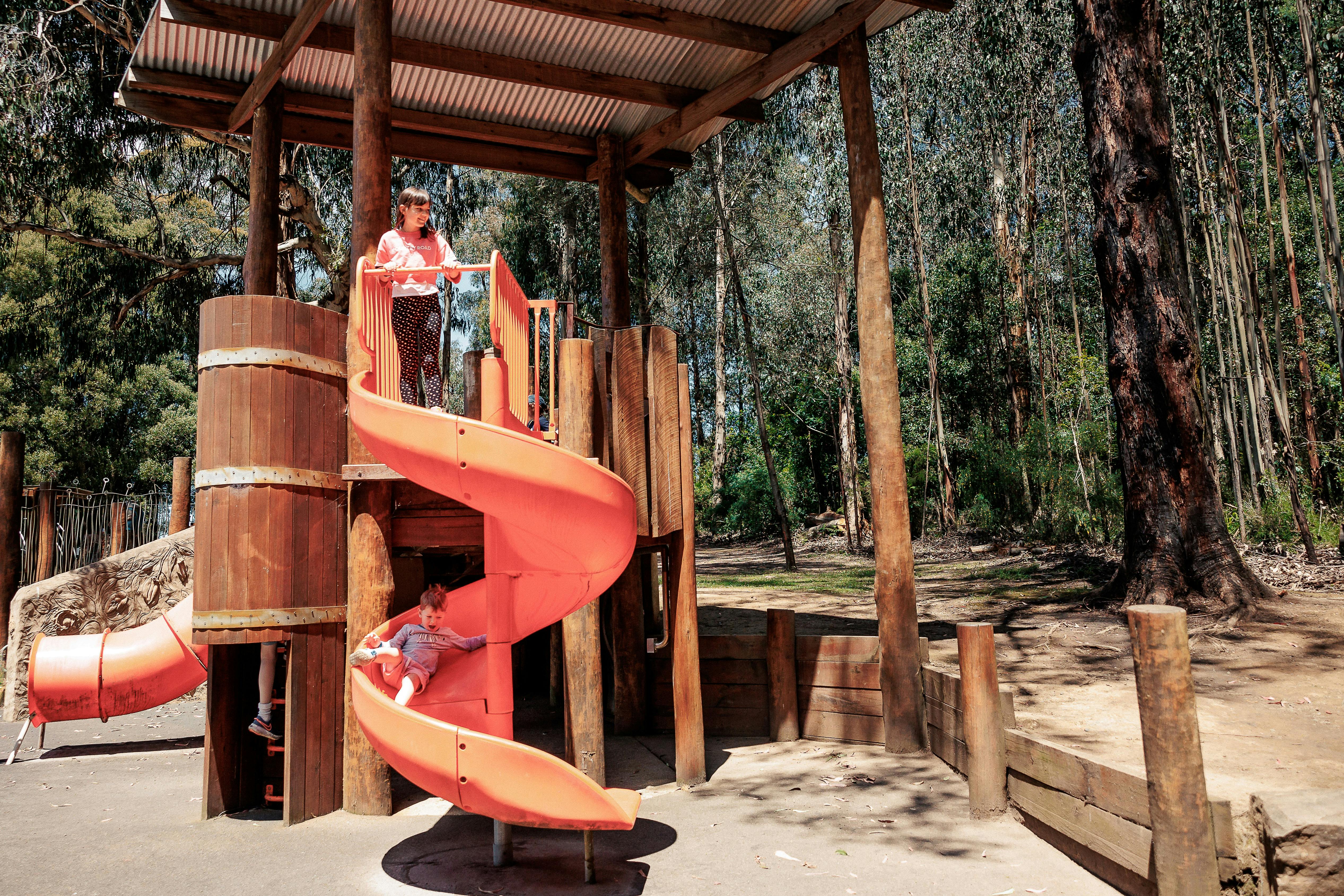 Child on a slide in a playground