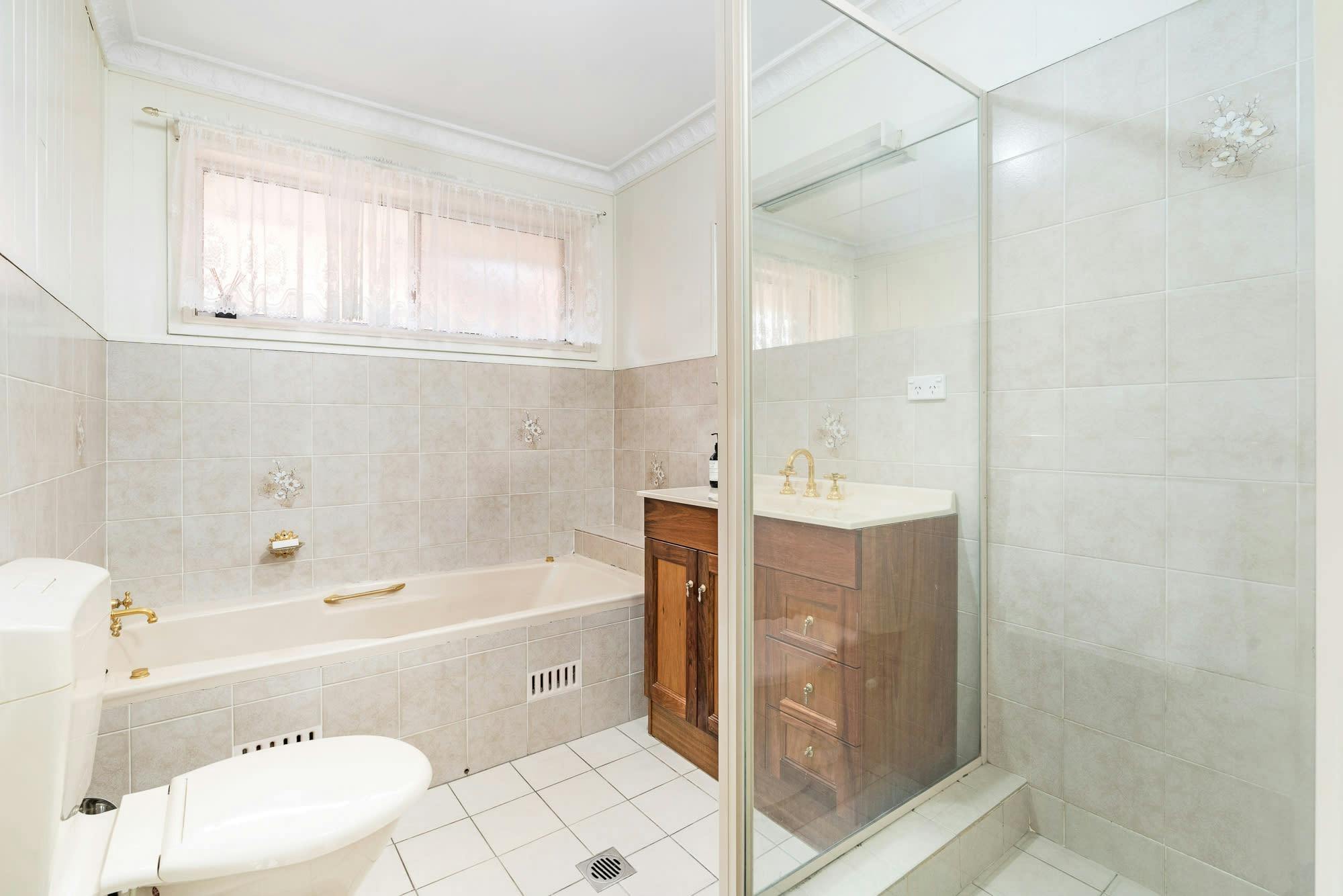 Bathroom with shower, bath and toilet
