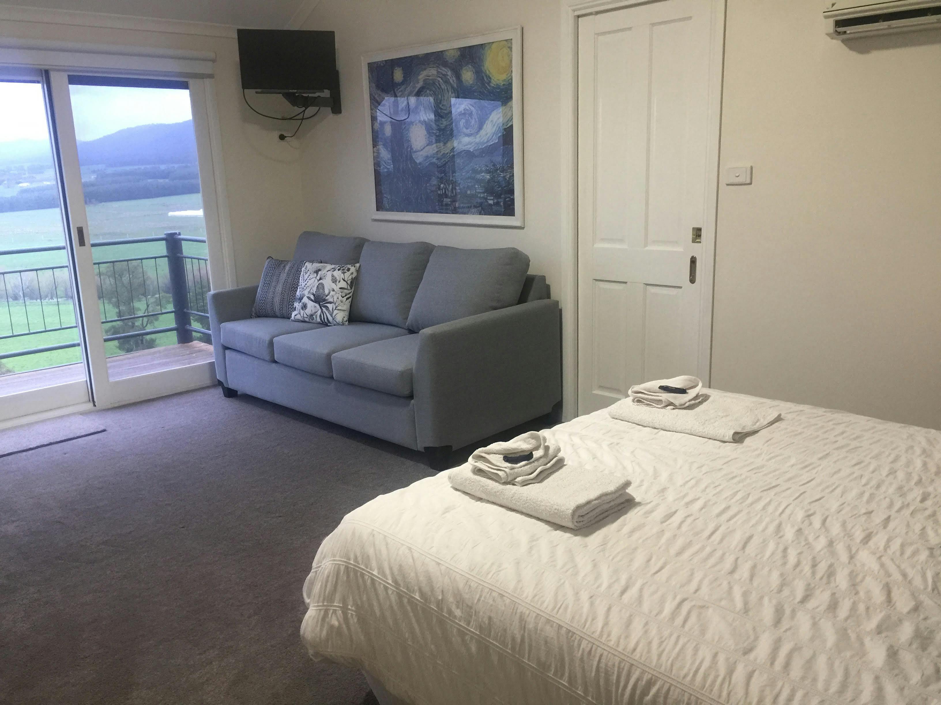 Deluxe Queen Bedroom with views.