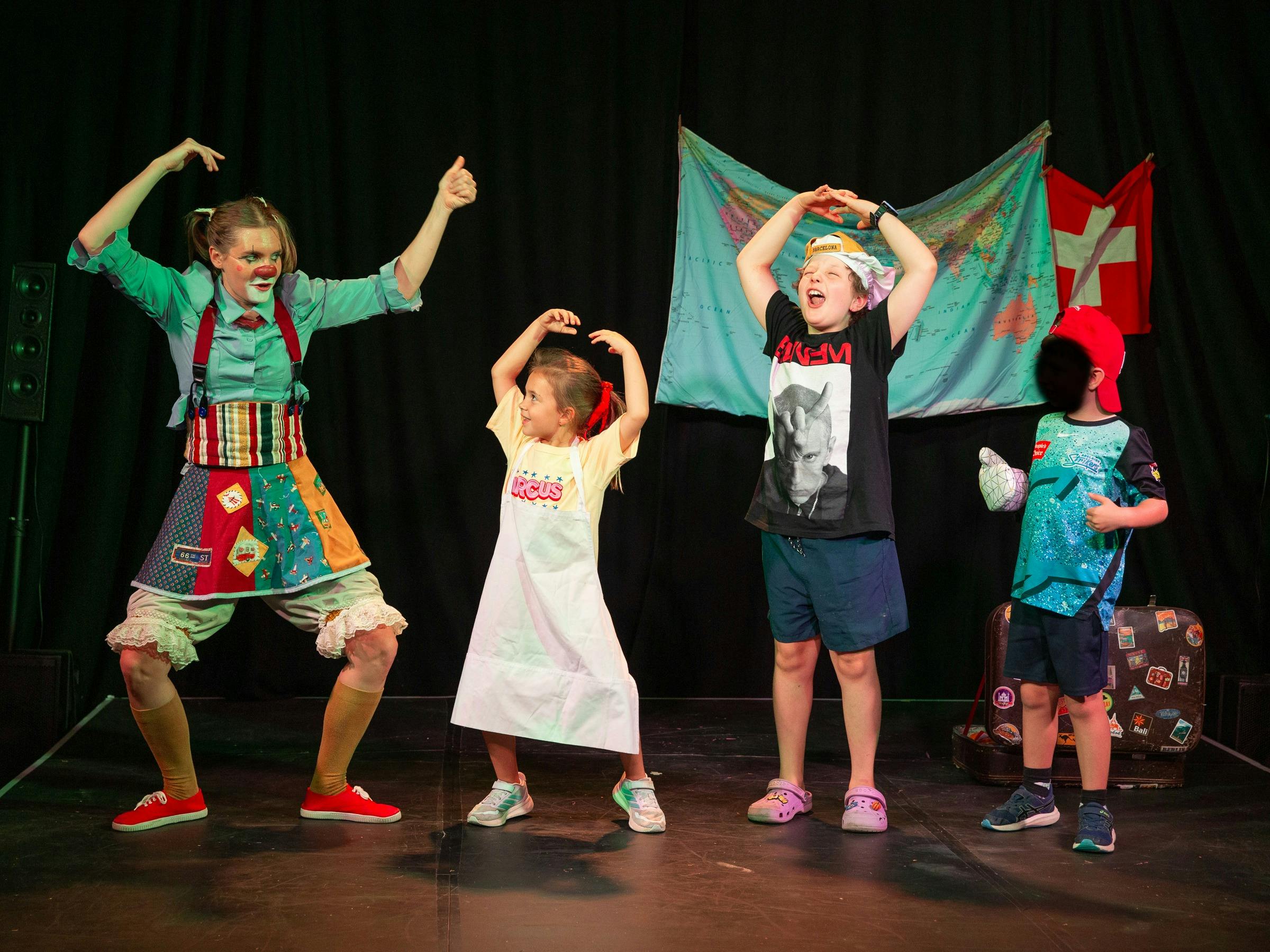 Pa the Traveller Clown and 3 kids doing movements