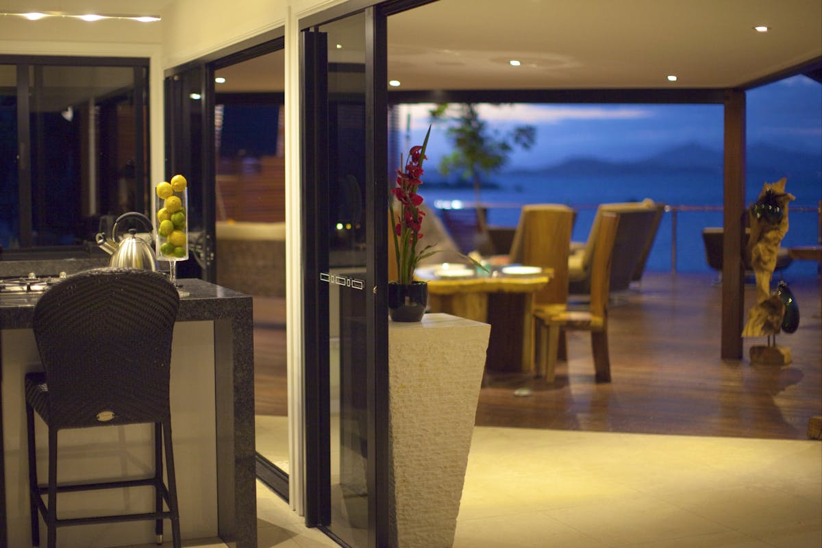 Alfresco Dining on the Large Expansive Undercover Deck over the Coral Sea and two private beaches