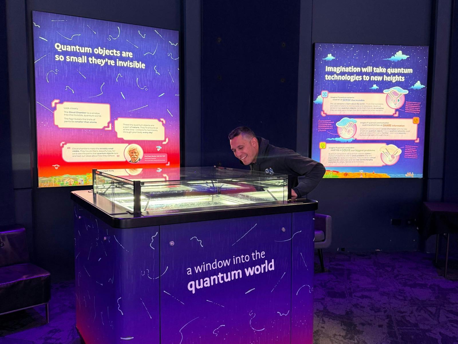 A man looking into a Cloud Chamber