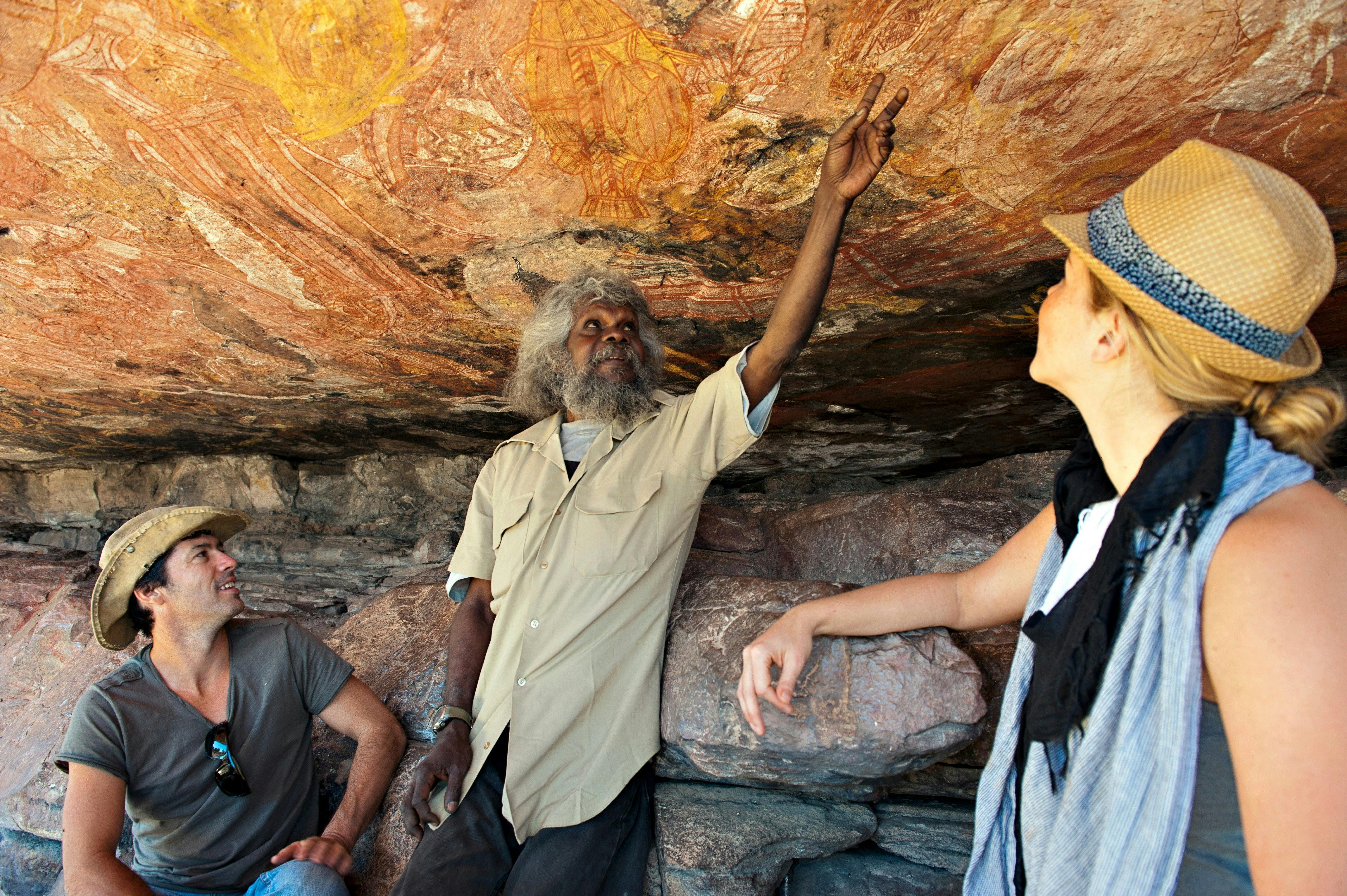 Traditional Owner interpreting the main gallery at Injaluk Hill in Western Arnhem Land