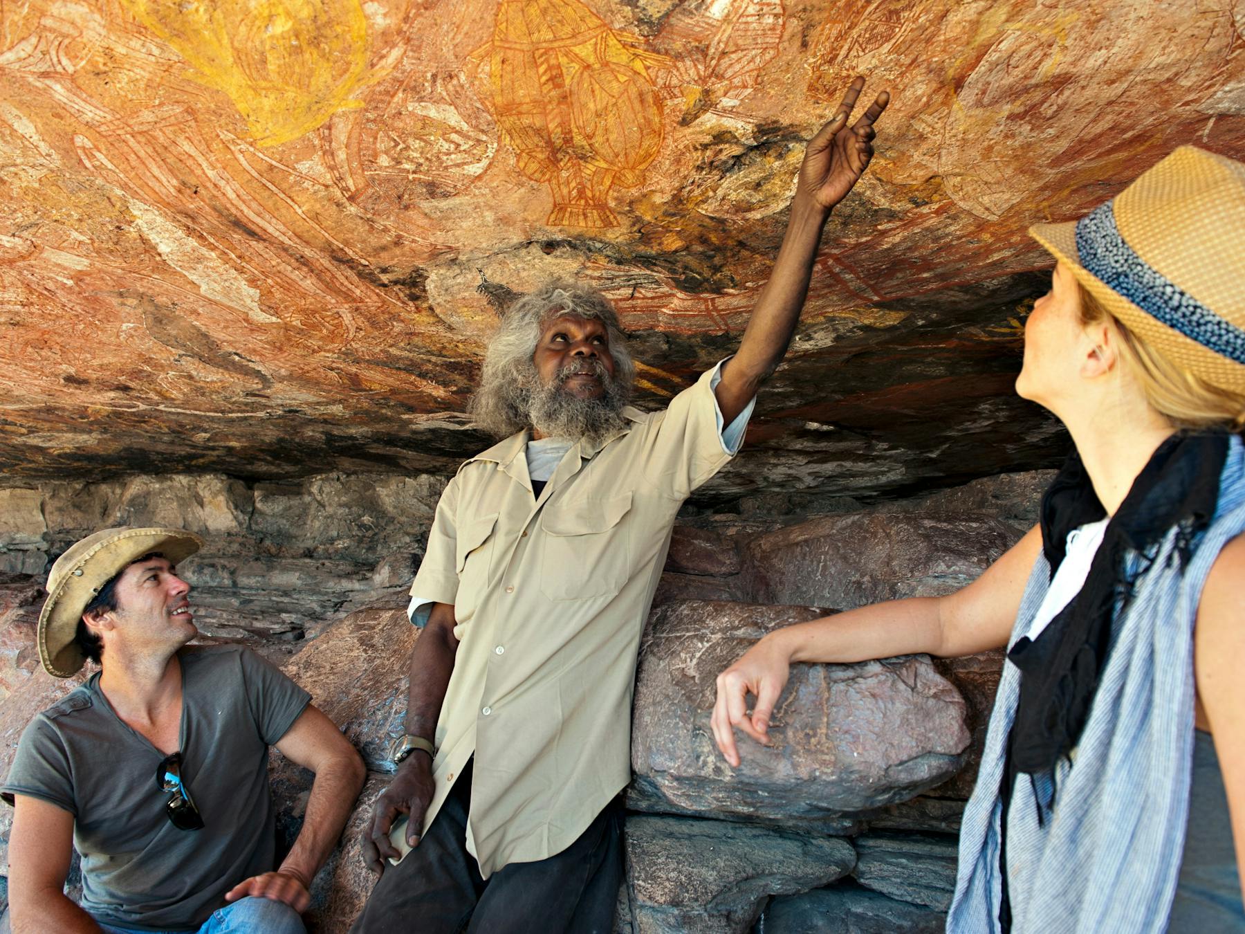 Traditional Owner interpreting the main gallery at Injaluk Hill in Western Arnhem Land
