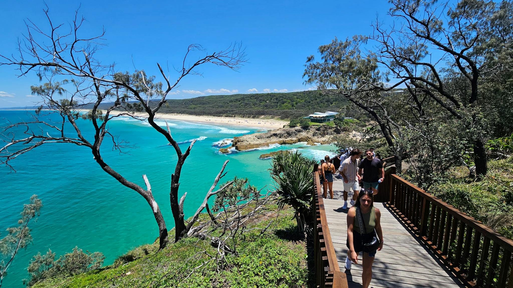 Scenic boardwalk walk with guests overlooking the ocean at Point Lookout, Stradbroke Island – a high Scenic boardwalk walk with guests overlooking the ocean at Point Lookout, Stradbroke Island – a high