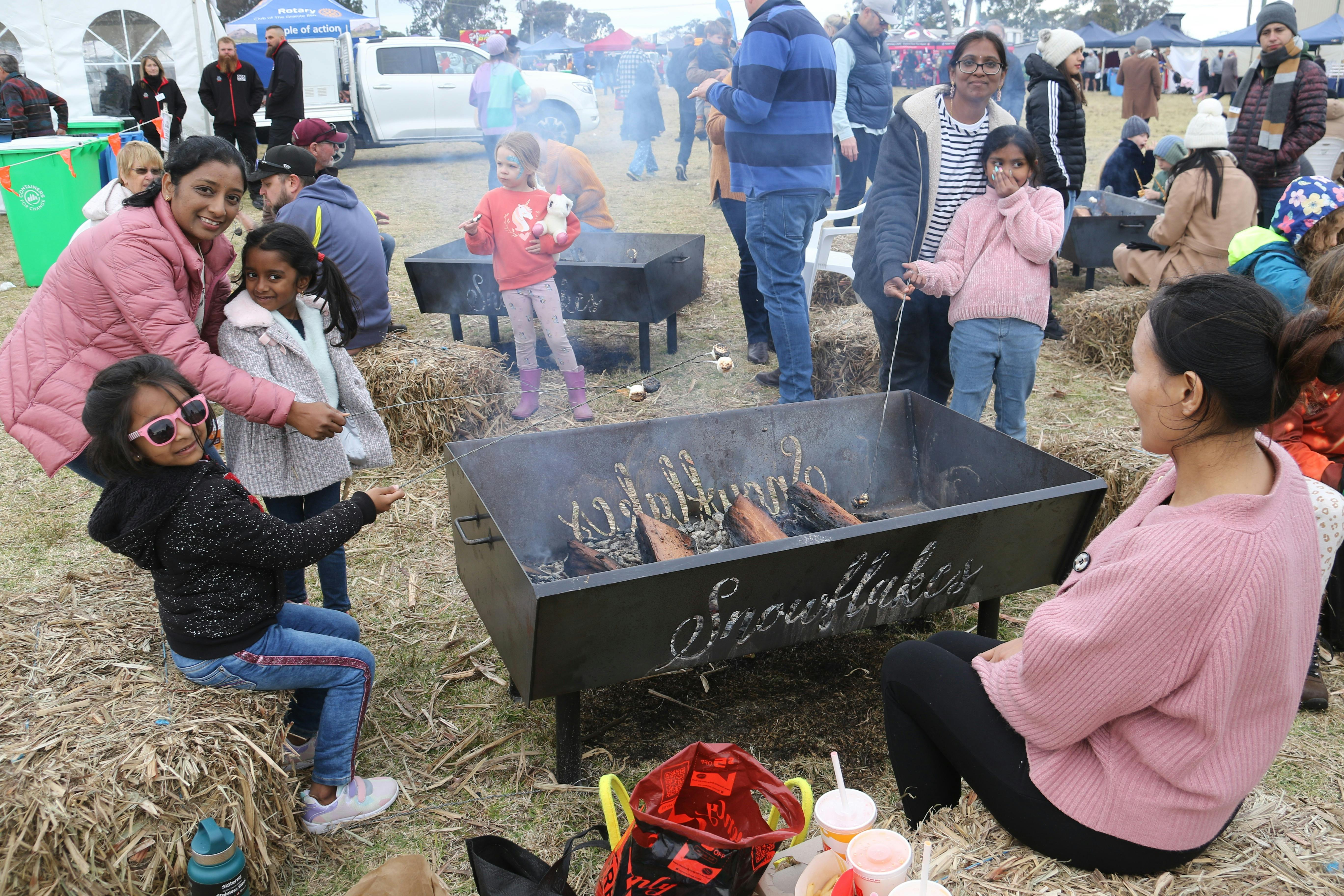 Toasting marshmallows at Snowflakes in Stanthorpe