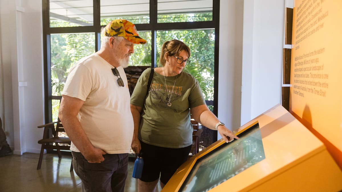 Visitor exploring the Unearth Etheridge Exhibit