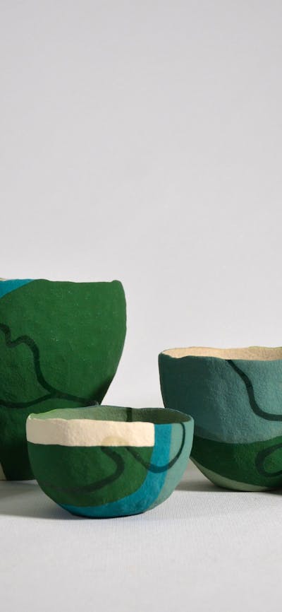 A cluster of pinched ceramic bowls