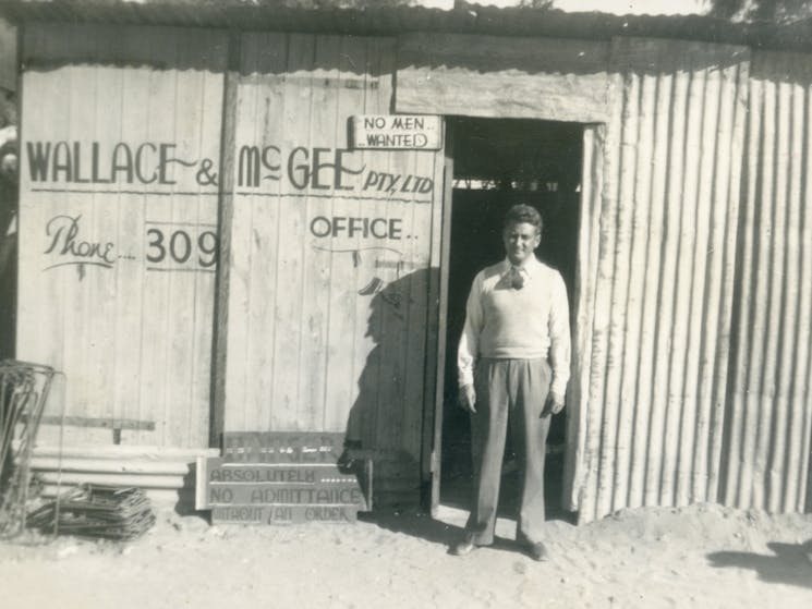 Believed to be Phil McGee in front of Wallace and McGee’s shed in Wingewarra St Dubbo c1930s